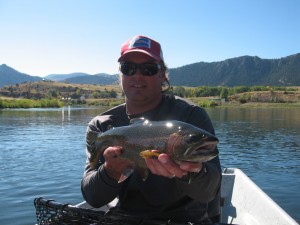 Doug Jones with a nice rainbow trout on a fly.